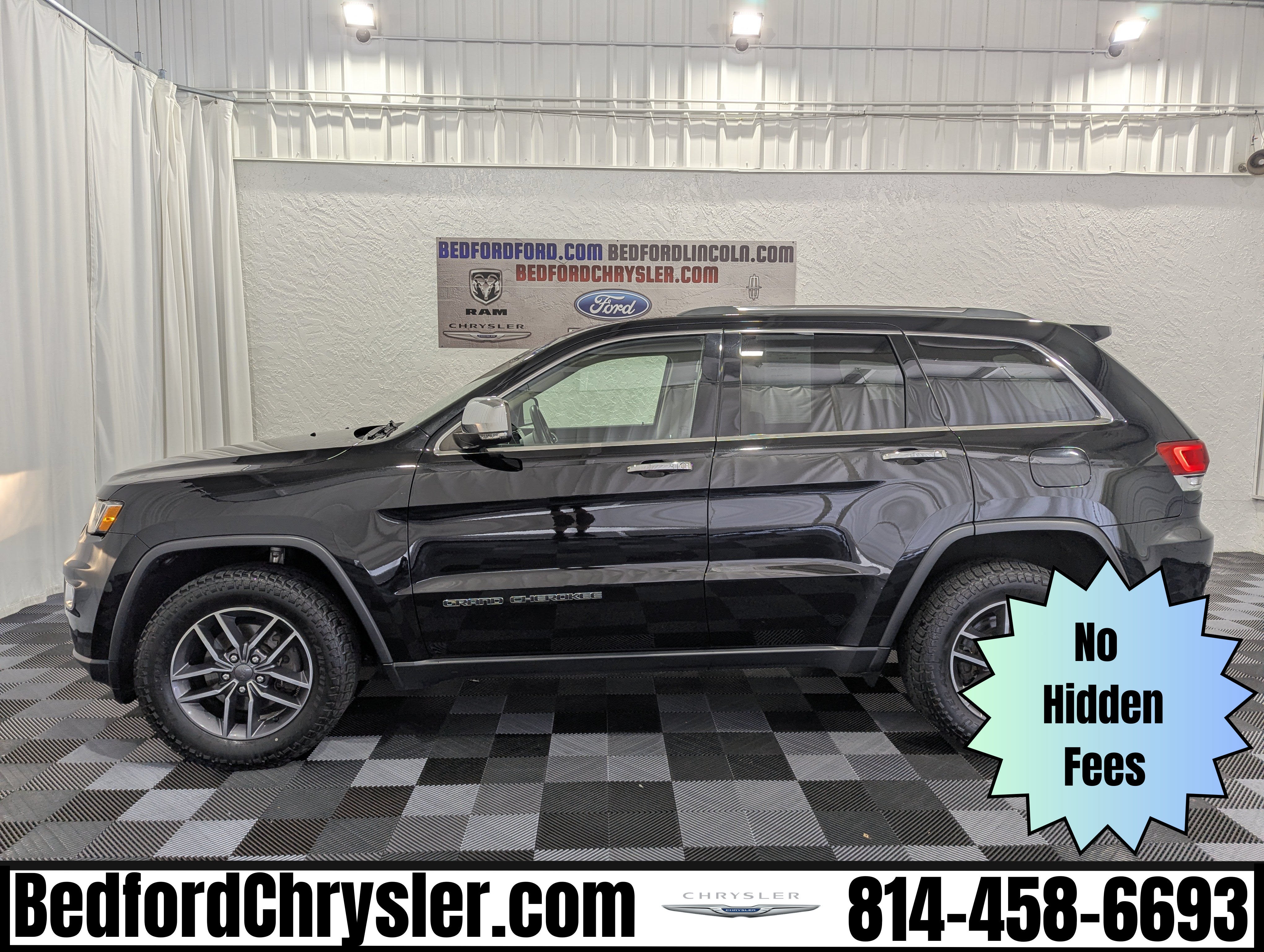 2019 Jeep Grand Cherokee Limited 4x4 in Diamond Black Crystal Pearlcoat — front three-quarter view