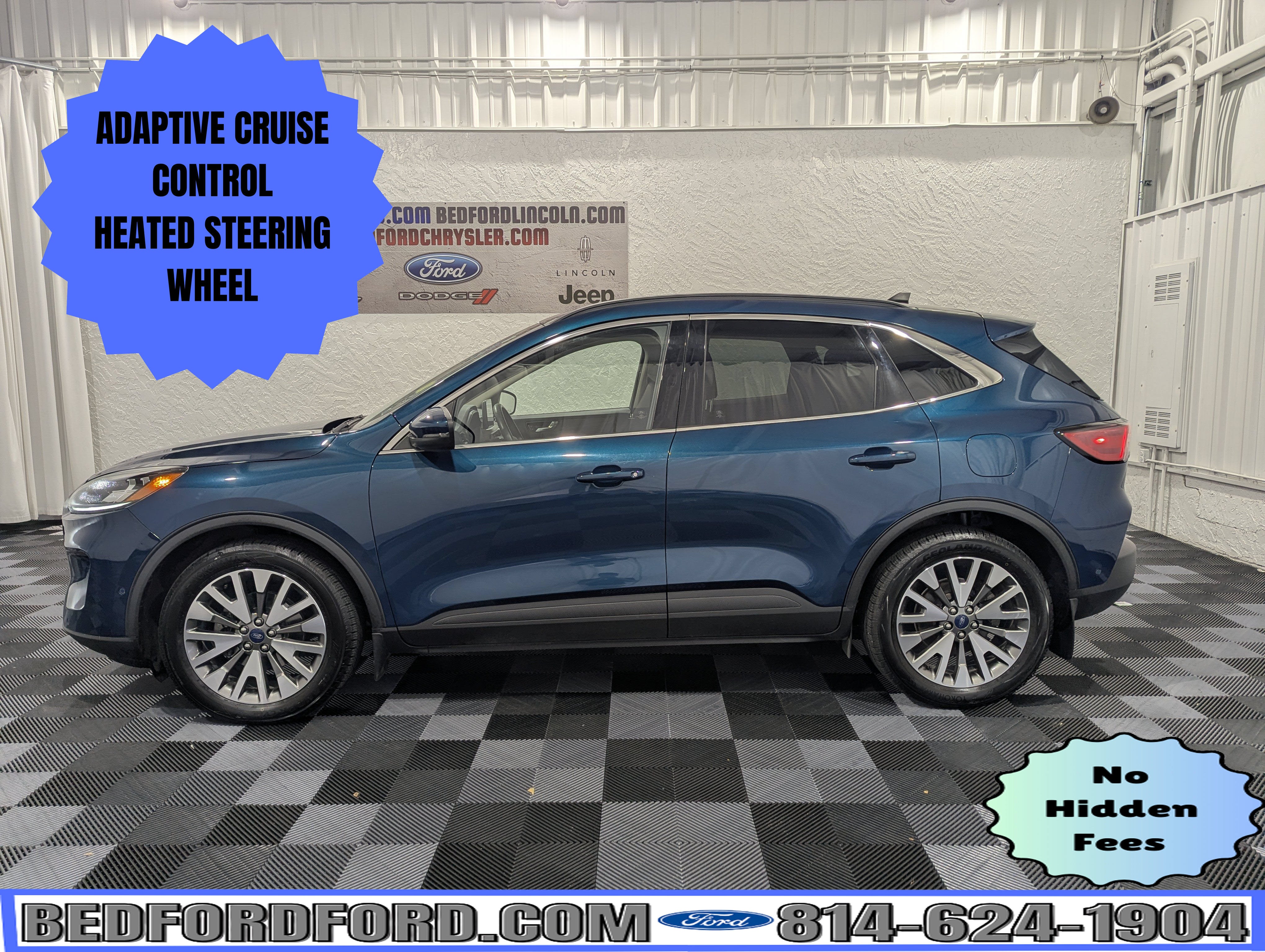2020 Ford Escape Titanium AWD in Dark Persian Green Metallic — front three-quarter view