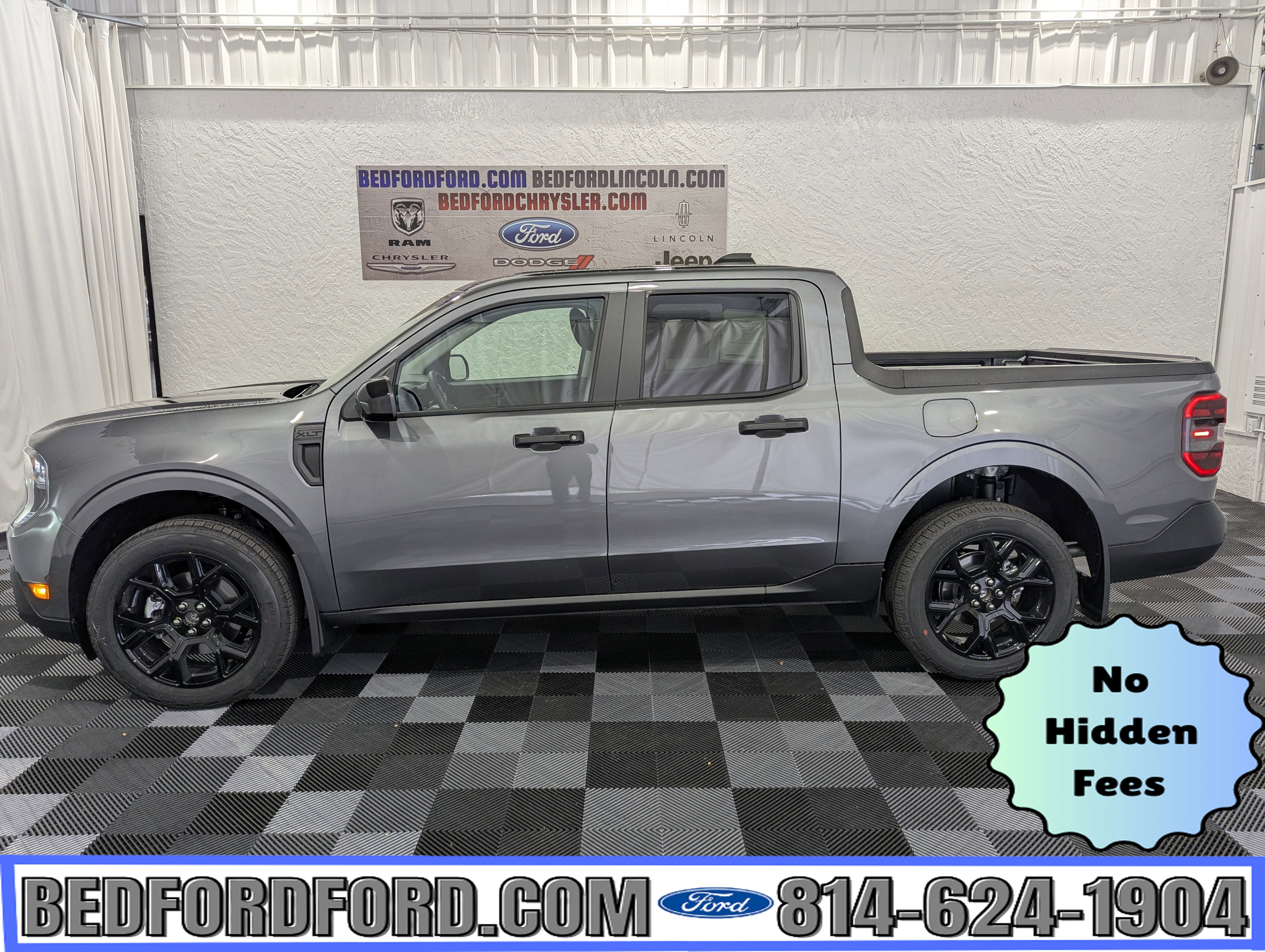 2026 Ford Maverick XLT AWD in Carbonized Gray Metallic — front three-quarter view