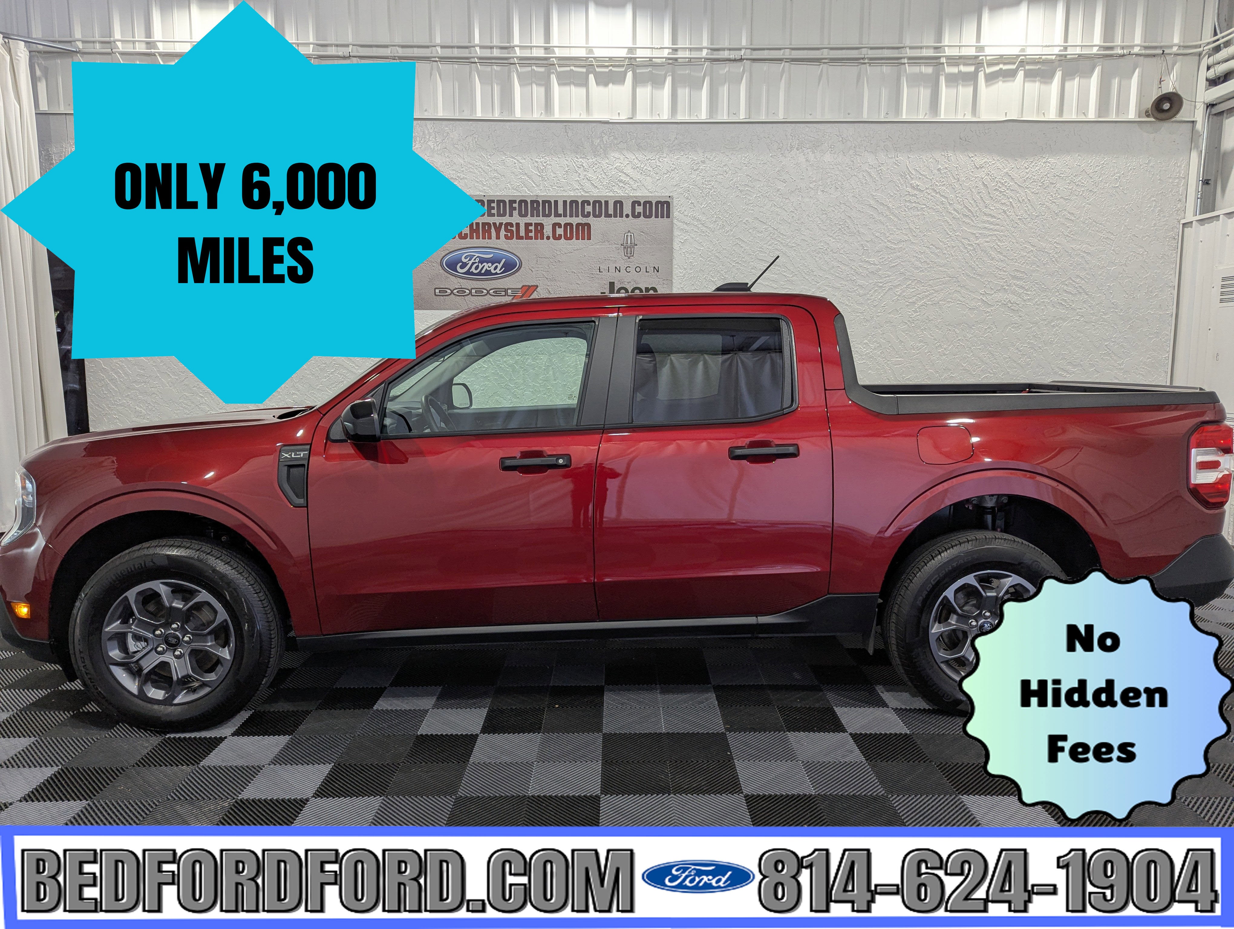 2025 Ford Maverick XLT AWD in Ruby Red Metallic — front three-quarter view